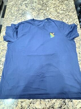 Navy Short Sleeve Tee with Small Multicolor Butterfly Logo runs small for a 4xl